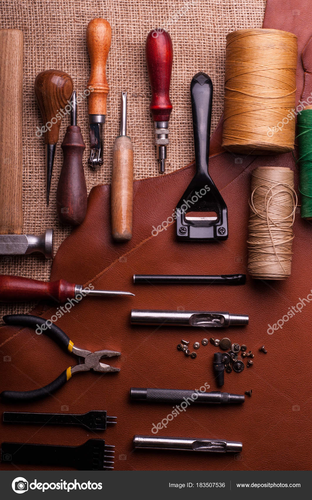 Manufacturing Leather Craft Iron Metal Buttons Sewing Spools Threads  Leather Stock Photo by ©ArtKvitka 183507536